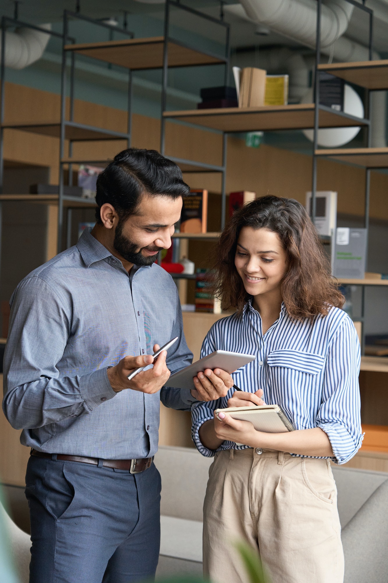 diverse-friendly-coworkers-talking-using-digital-tablet-in-office-.jpg diverse-friendly-coworkers-talking-using-digital-tablet-in-office-.jpg